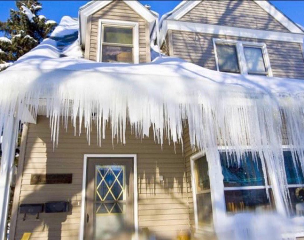 house with large ice dam