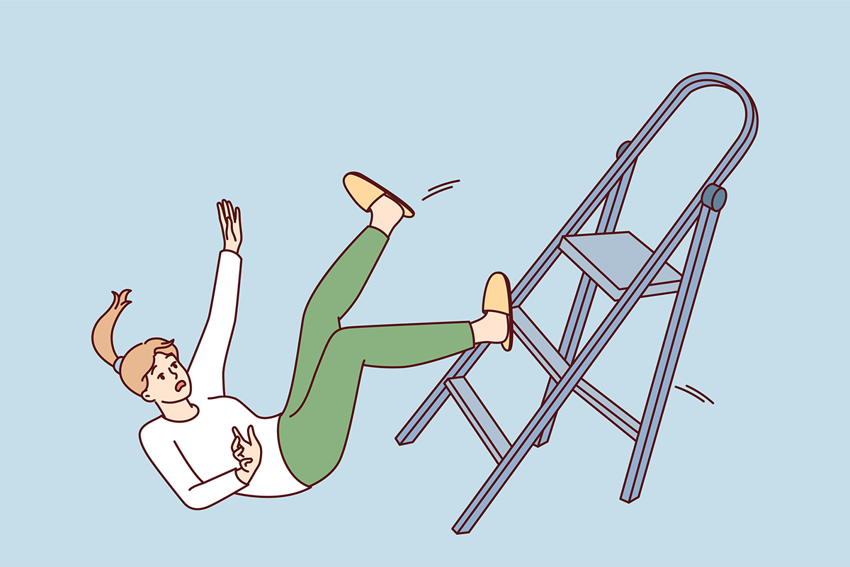 woman falling off ladder